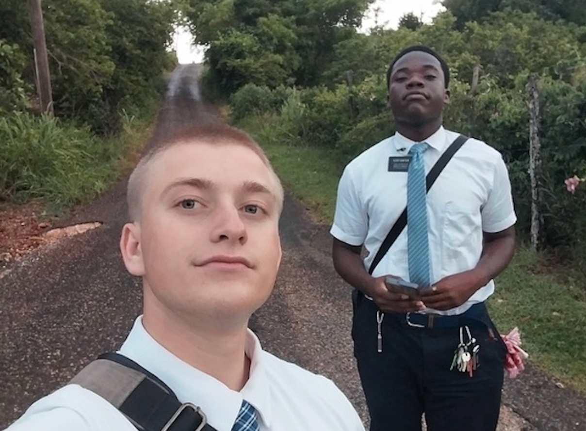 A selfie of two people standing on a road with trees

AI-generated content may be incorrect.