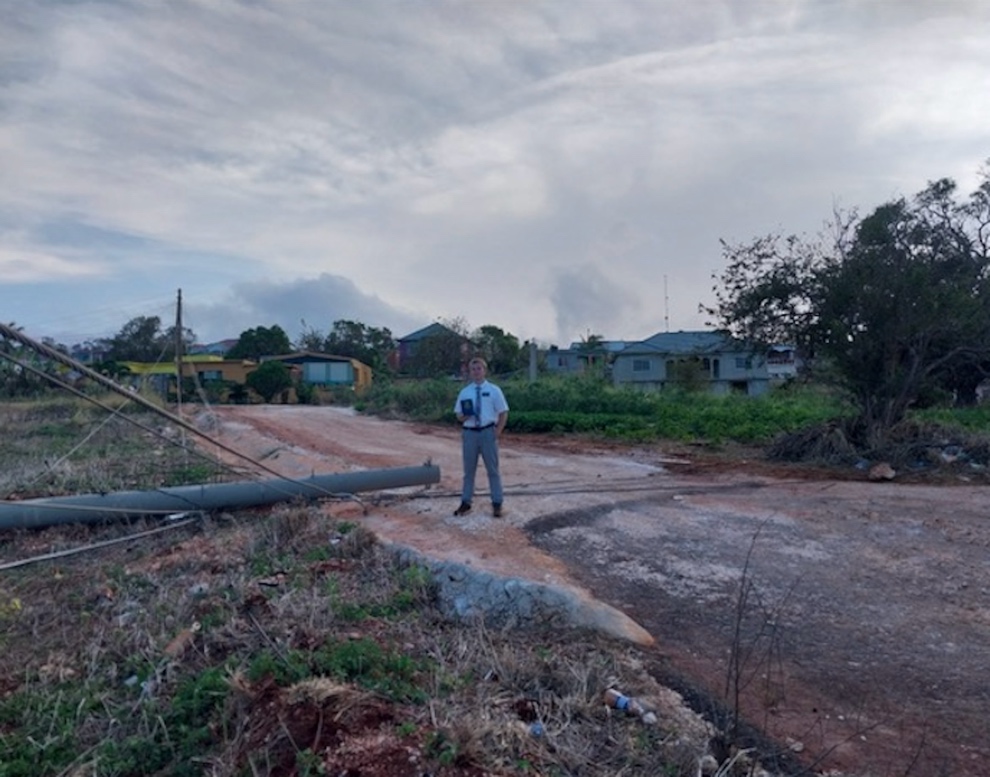 A person standing in a dirt area

AI-generated content may be incorrect.
