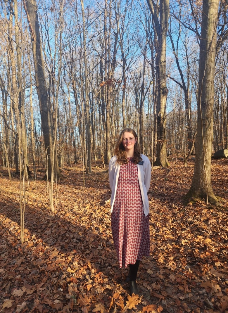 A person standing in a forest

AI-generated content may be incorrect.
