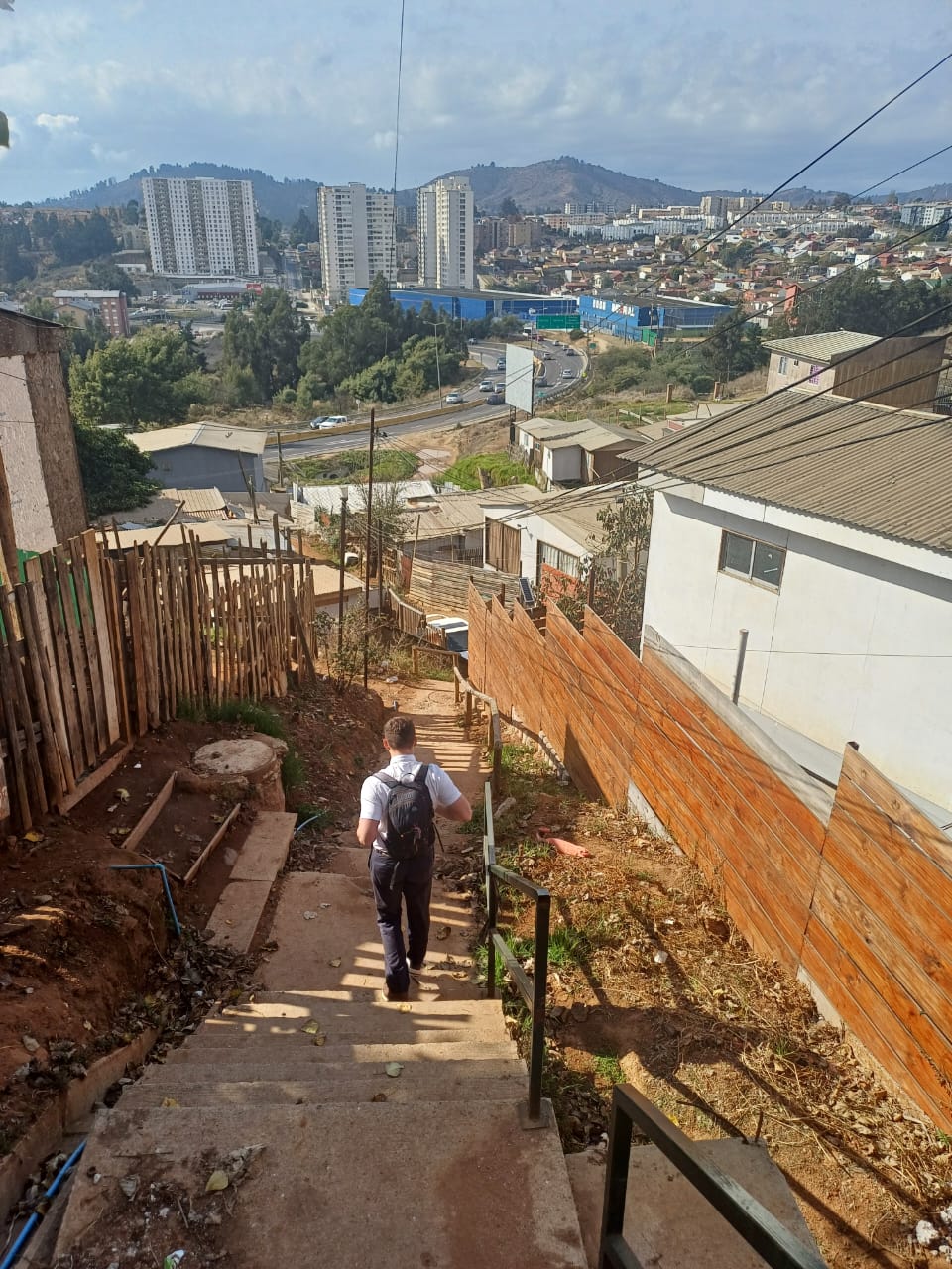 A person walking up a staircase

AI-generated content may be incorrect.