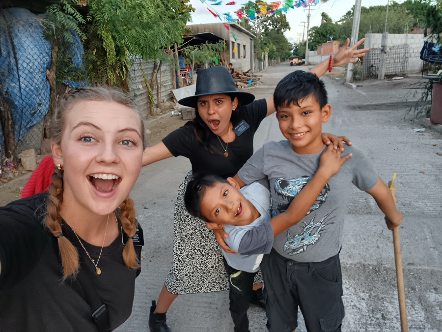A group of people posing for a photo

AI-generated content may be incorrect.