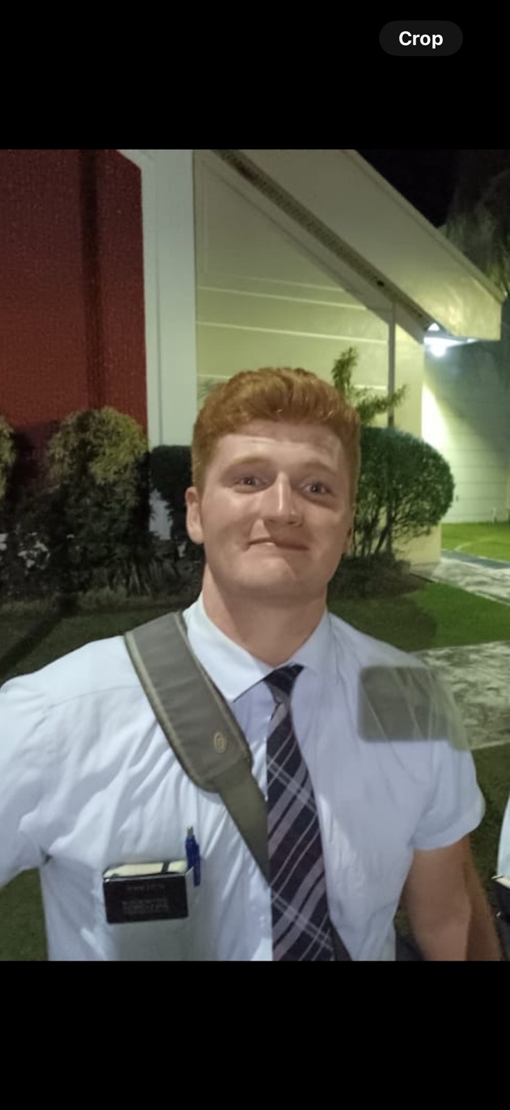 A person wearing a white shirt and tie

AI-generated content may be incorrect.