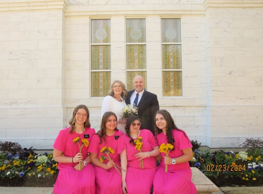 A group of women in pink dresses

AI-generated content may be incorrect.